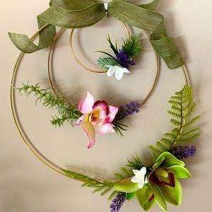 Handmade Wreath with metal hoops and artificial flowers.